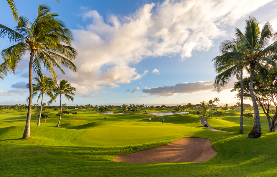 Kapolei Golf Course set up for a wedding, with outdoor ceremony and reception spaces overlooking lush fairways and tropical landscapes.