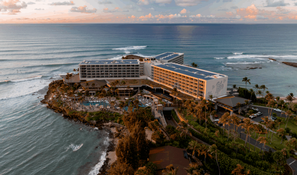 Aerial view of The Ritz-Carlton, showcasing the resort’s beachfront location, pools, and surrounding tropical landscape.